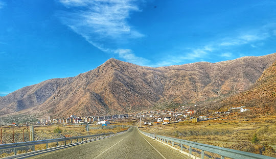 Modern apartment buildings and houses in Bulqizë  showcasing beautiful real estate properties