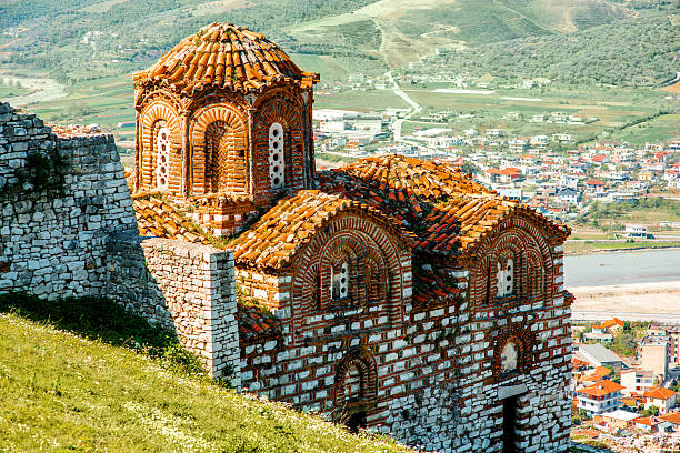 Modern apartment buildings and houses in Berat showcasing beautiful real estate properties