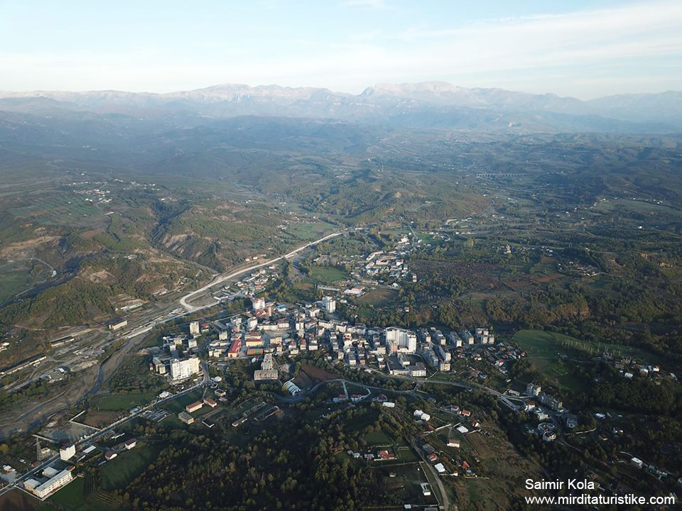 Modern apartment buildings and houses in Rrëshen  showcasing beautiful real estate properties