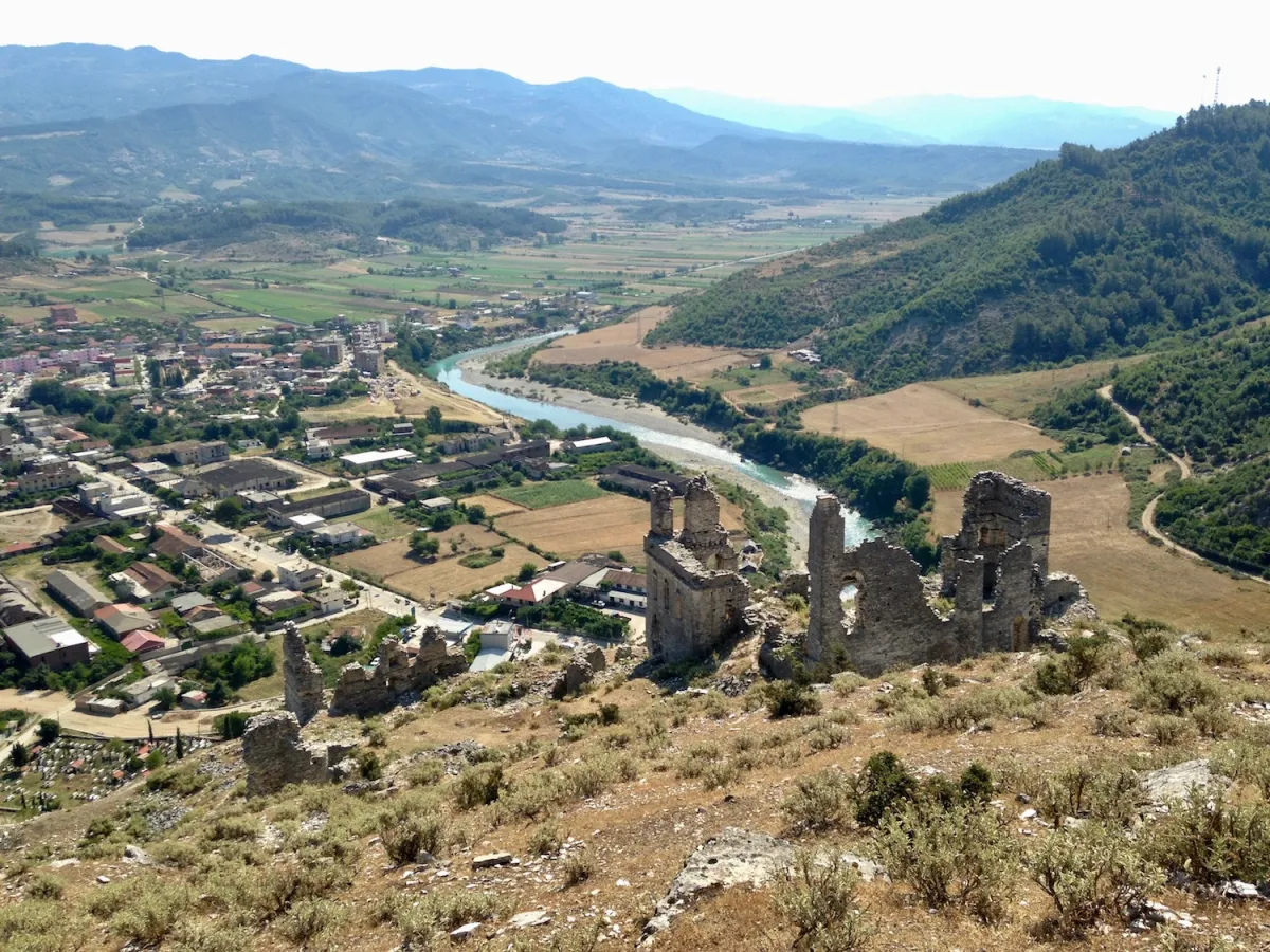 Modern apartment buildings and houses in Këlcyrë  showcasing beautiful real estate properties