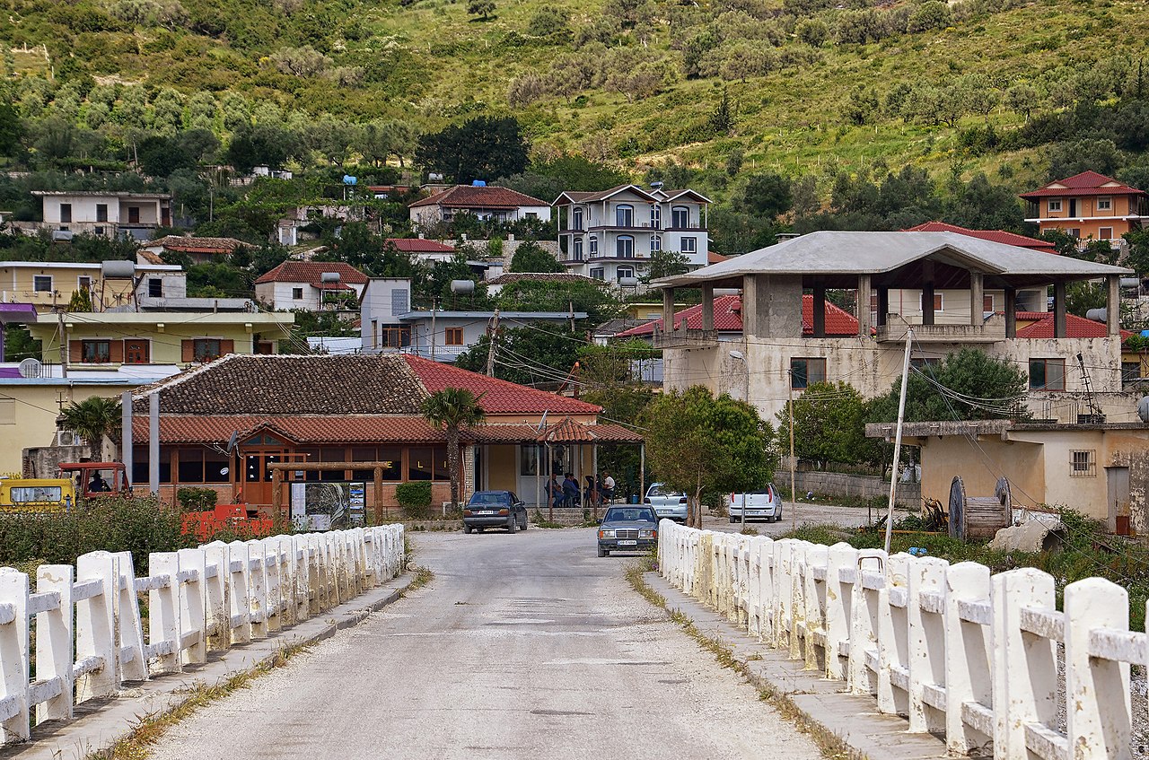 Modern apartment buildings and houses in Selenicë  showcasing beautiful real estate properties
